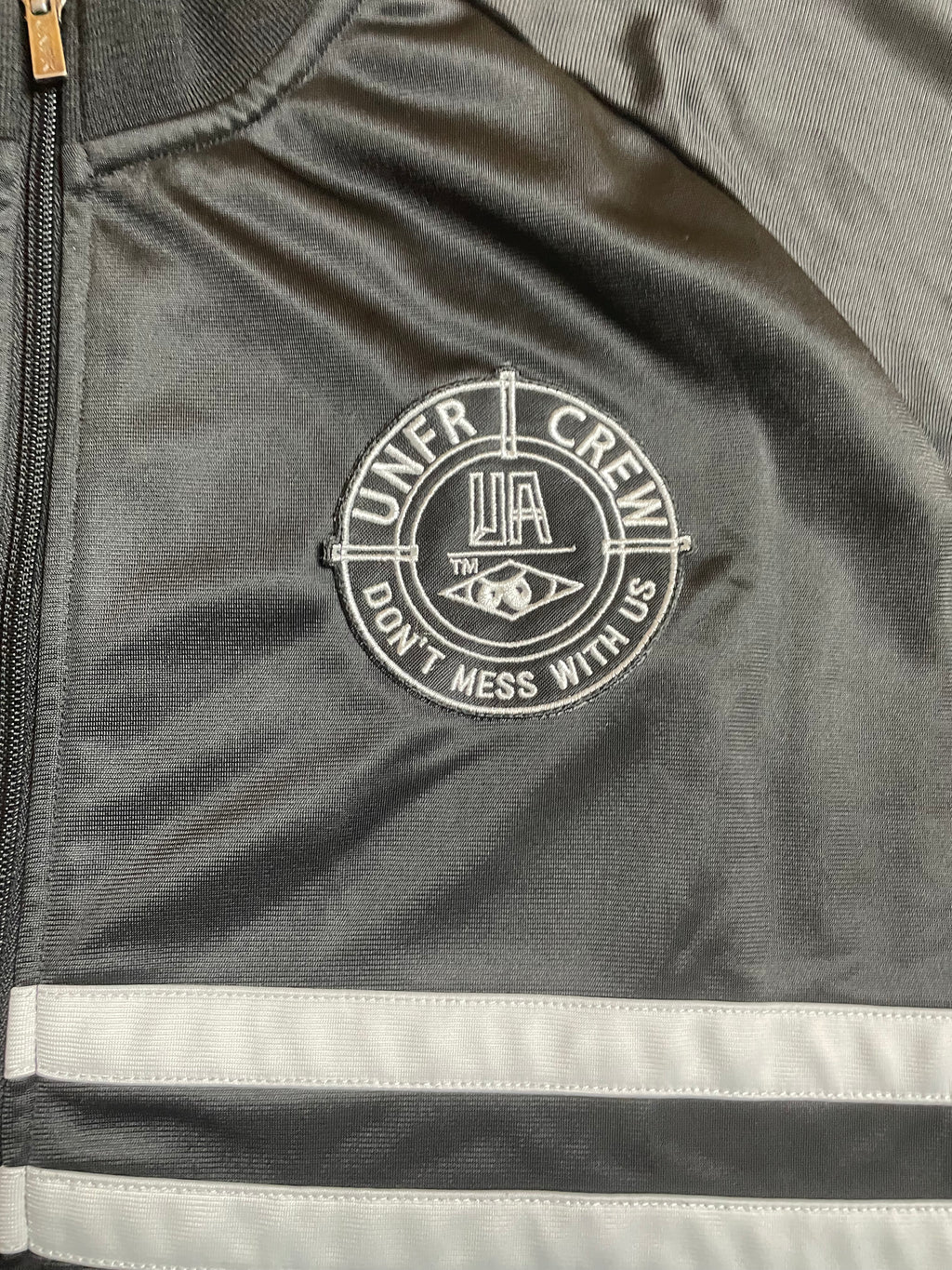Unfair Athletics Trainingsjacke in schwarz, weiß - Gr. M