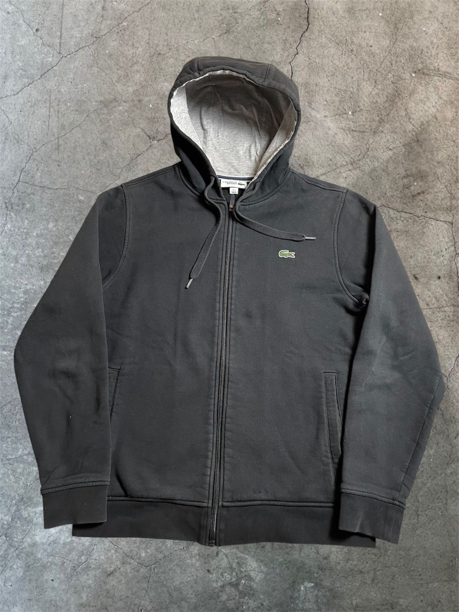 Lacoste Strickjacke mit Kapuze in schwarz - Gr. M